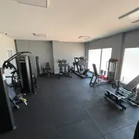 Panoramica della sala attrezzi dello studio privato One to One di Brescia